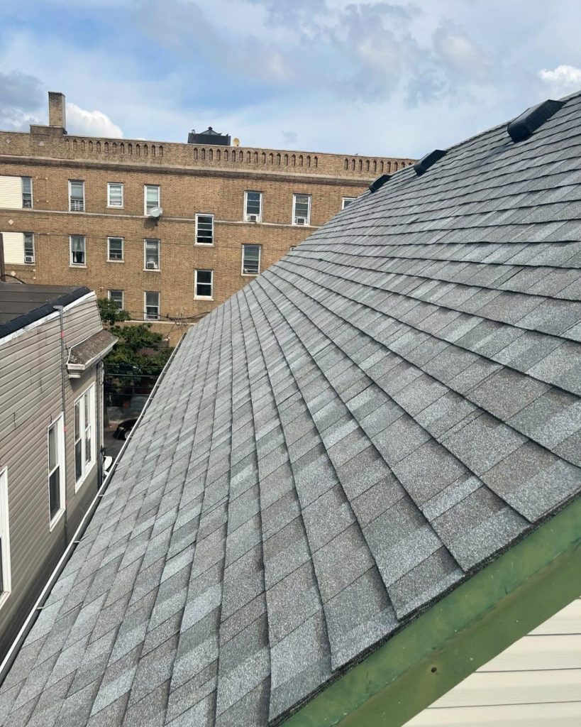 Brand new architectural shingle roof completed by Genesis Roofing